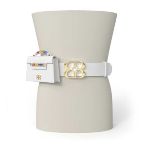 White Italian leather belt attached to form waist with large yellow gold and clear crystal BB logo stretching just above and below the belt. To the side of the BB logo, the white Rainbow Baby Jewel Crossbody bag is attached to the belt.