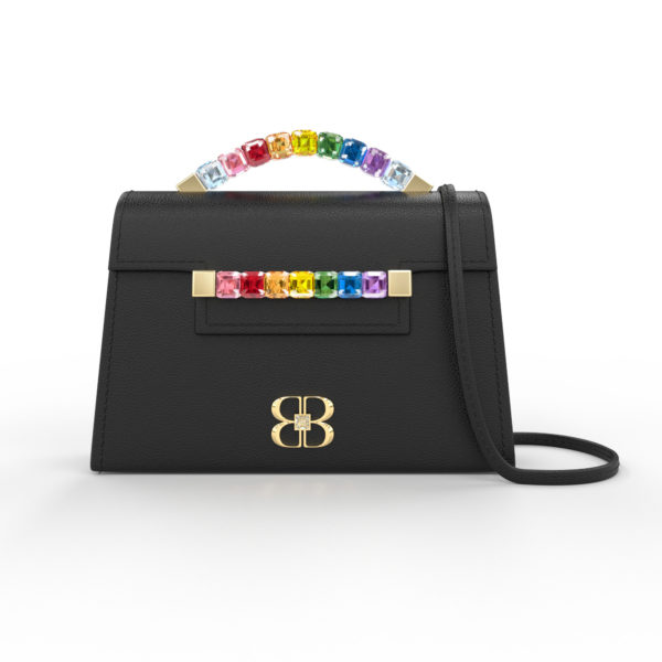 Front view of black Rainbow Baby Jewel Crossbody bag with a tapered trapezoidal shape, multi-colored Swarovski crystal top handle and front strap, yellow gold hardware, yellow gold and crystal BB plaque, and black detachable shoulder strap.